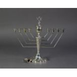 SILVER MENORAH WITH NINE SOLID ANGULAR CANDLE BRACKETS, urn pattern centre with Star of David finial