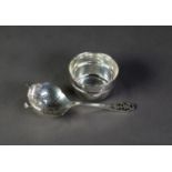 SILVER TEA STRAINER, with cut card pierced handle and the bowl stand, Sheffield 1966 & 1967, 2 ¾ ozs