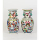 TWO 20TH CENTURY CHINESE PORCELAIN POLYCHROME DECORATED OVULAR VASES, each with two Buddhistic