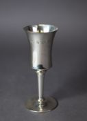 MODERN PLAIN SILVER GOBLET, with gilt interior to the waisted bowl, tapering stem and circular foot,