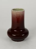 CHINESE QING DYNASTY FLAMBÉ GLAZED VASE, with swollen lower part and slightly tapered cylindrical