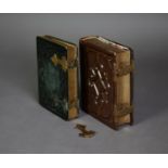TWO EDWARDIAN BOOK PATTERN SMALL PHOTOGRAPH ALBUMS, each with embossed leather boards, gilt metal