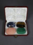 CASED SET OF FOUR MODERN ORIENTAL CARVED HARDSTONE INK DISHES, each of shallow, rounded oblong form,