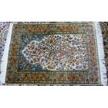 KERMAN, PERSIAN PART SILK PICTORIAL PRAYER RUG, the white field filled with a single large tree