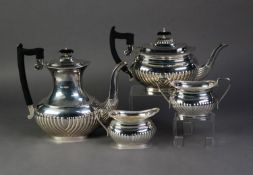 SILVER TEA AND COFFEE SERVICE OF FOUR PIECES of Georgian style, bulbous oval and semi-lobed, on