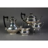 SILVER TEA AND COFFEE SERVICE OF FOUR PIECES of Georgian style, bulbous oval and semi-lobed, on