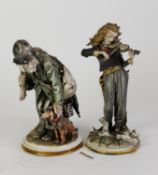 TWO MODERN CAPO DI MONTE FIGURES, one of a tramp with dog, the other of a young violinist (2)