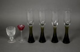 STYLISH SET OF FOUR MODERN FLUTE GLASSES WITH TAPERING GREEN BASES, 9 ¾? (24.7cm) high, together