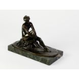 WENDY GRACE, PATINATED BRONZE SEATED FEMALE NUDE, ?ACIDALIA?, modelled sat on a rocky outcrop,