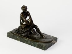 WENDY GRACE, PATINATED BRONZE SEATED FEMALE NUDE, ?ACIDALIA?, modelled sat on a rocky outcrop,