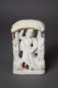 ANTIQUE EASTERN CARVED WHITE MARBLE FIGURE standing under an awning, traces of colouring, 5? (12.