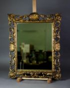 RECTANGULAR WALL MIRROR in carved and gilt wood rococo frame, 19 ¾? (50cm) wide, 24 ½? (62.2cm) high