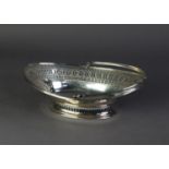 EDWARDIAN SILVER OVAL SWING HANDLED CAKE BASKET, with Adams style cut card pierced and engraved