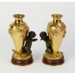 AUGUSTE MOREAU (1834-1917), PAIR OF PATINATED AND GILT BRONZE FIGURAL ORNAMENTS, each modelled