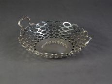 SILVER CIRCULAR TWO-HANDLED DISH, the sides with pierced ovals and dots pattern, also forming the