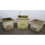 SUITE OF THREE RECONSTITUTED STONE CLASSICALS STYLE SQUARE GARDEN VASES, the exteriors embossed to