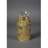 EARLY TWENTIETH CENTURY FRENCH SET OF FOUR SCENT BOTTLES IN ORNATELY PIERCED GILT METAL