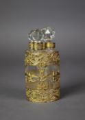 EARLY TWENTIETH CENTURY FRENCH SET OF FOUR SCENT BOTTLES IN ORNATELY PIERCED GILT METAL
