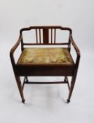 EDWARDIAN LINE INLAID MAHOGANY PIANO STOOL, with raised back and arms, box seat with lift-up top, on