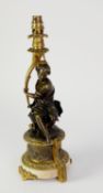 PATINATED AND GILT BRONZE FIGURAL TABLE LAMP, modelled as a seated female figure holding a