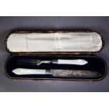 CASED VICTORIAN SILVER BLADED TWO PIECE CARVING SET WITH CARVED MOTHER OF PEARL HANDLES, the blade