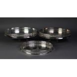PAIR OF ITALIAN ELECTROPLATE ENGRAVED CIRCULAR TRAYS, with cut card pierced gallery sides, on