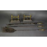 THREE PIECE STEEL FIRESIDE TOOL SET WITH CAST BRASS HANDLES, together with a PAIR OF BRASS FIRE