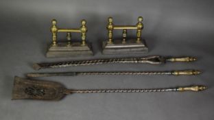 THREE PIECE STEEL FIRESIDE TOOL SET WITH CAST BRASS HANDLES, together with a PAIR OF BRASS FIRE