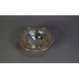 GEORGE V PIERCED SILVER PEDESTAL BON BON DISH, of hexagonal form with moulded circular foot and