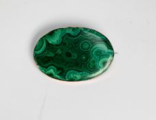 LARGE OVAL MALACHITE BROOCH, in gold coloured metal frame, 2in (5cm) wide