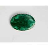 LARGE OVAL MALACHITE BROOCH, in gold coloured metal frame, 2in (5cm) wide