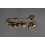 9ct GOLD CHARM BRACELET, 9ct GOLD PADLOCK CLASP; six 9ct GOLD CHARMS, 12.6gms