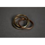 9CT THREE-COLOUR GOLD TRIPLE INTERLOCKING BAND RINGS (1), ring size K, 3.3gms