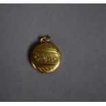 SMALL CIRCULAR GOLD COLOURED METAL (unmarked) LOCKET PENDANT, with floral engraved front, 2.7gms