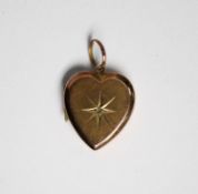 SMALL HEART SHAPED LOCKET PENDANT, the front with a tiny diamond, in star shaped setting, (