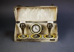 GEORGE V CASED THREE PIECE SILVER AND YELLOW GUILLOCHE ENAMELLED DRESSING TABLE CLOCK SET,