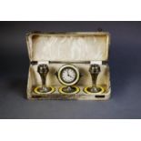 GEORGE V CASED THREE PIECE SILVER AND YELLOW GUILLOCHE ENAMELLED DRESSING TABLE CLOCK SET,