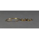 9ct TORQUE BANGLE with star pattern terminals, 2.7gms and a pair of 9ct gold hoop EARRINGS 1.8gms (