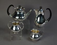 ERIC CLEMENTS FOR MAPPIN & WEBB, STYLISH FOUR PIECE ELECTROPLATED TEASET, of bellied form with black