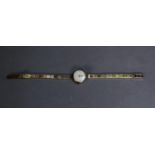 UNO SWISS LADY'S 9ct GOLD BRACELET WATCH with 21 jewels incabloc movement, circular white dial