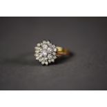 18ct GOLD AND DIAMOND THREE TIER CLUSTER RING, with raised centre diamond, approximately .20ct,