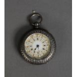 LADY?S SWISS ENGRAVED SILVER FOB WATCH, with key wind movement, decorated roman dial