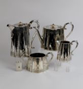 FOUR PIECE LATE VICTORIAN ENGRAVED ELECTROPLATED TEA SET BY JOHN ROUND & SONS, of shaped, tapering