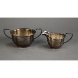 GEORGE V SILVER SUGAR AND CREAM SET, of lobated form with angular scroll handles, 7.2oz, Chester