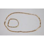 9ct GOLD NECKLACE with long and short flattened curb pattern links, 20 1/2in (52cm) long and the