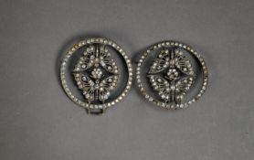 LARGE PASTE SET BUCKLE with large circlets, the open work centres of double butterfly pattern, in