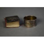 EDWARD VII MINIATURE BOOK OF COMMON PRAYER WITH EMBOSSED SILVER FRONT, decorated with angelic faces,