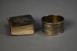 EDWARD VII MINIATURE BOOK OF COMMON PRAYER WITH EMBOSSED SILVER FRONT, decorated with angelic faces,