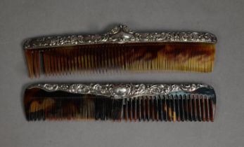 TWO HAIR COMBS, with embossed silver mounts