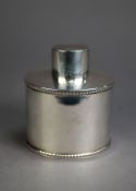 GEORGE V SILVER TEA CADDY, oval and straight sided with gadroon edge to the top and bottom, plain